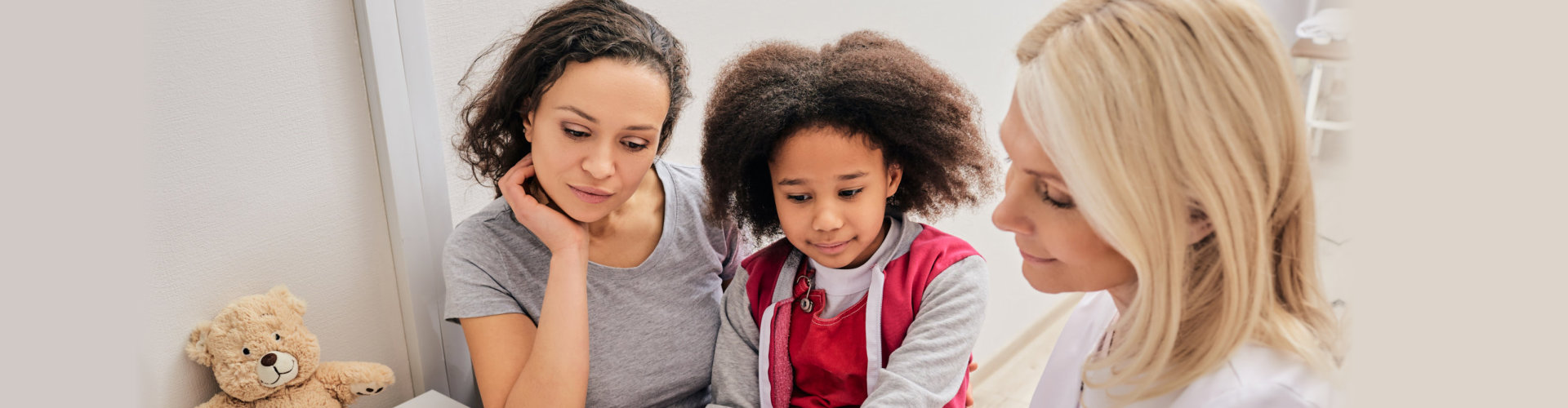 mother and son listening to expert